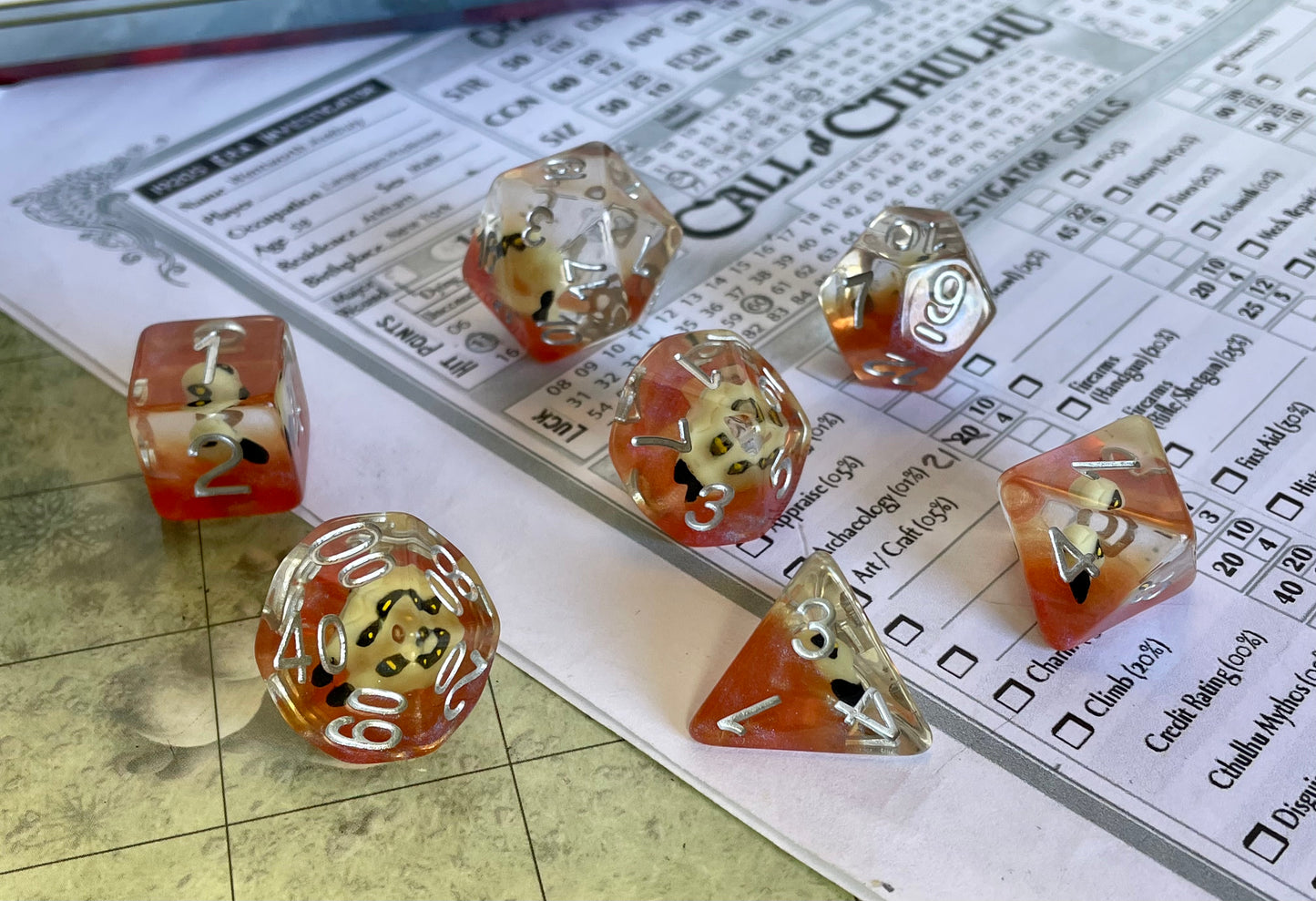 Entombed Poly Dice Set- Bird Skull in Orange