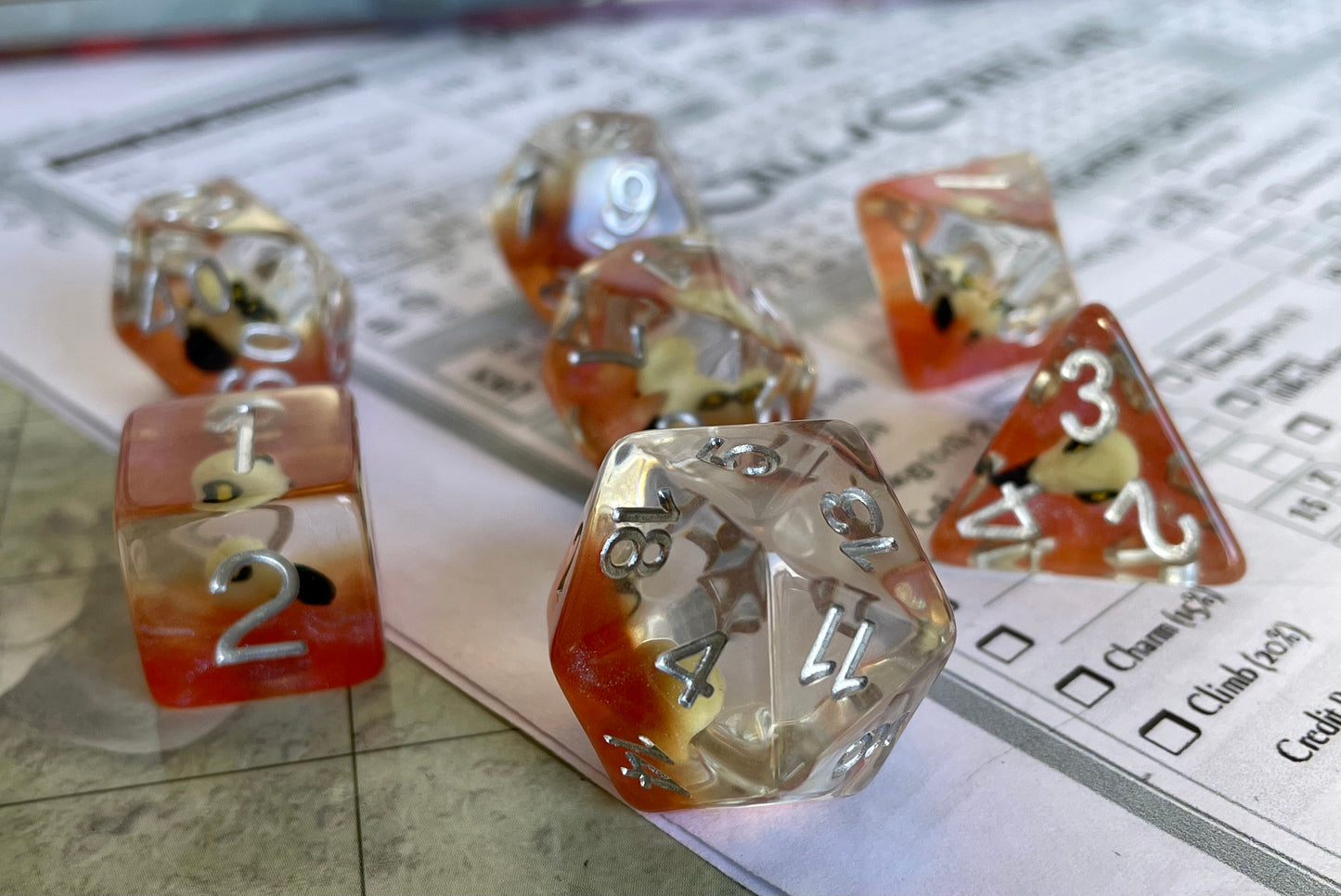 Entombed Poly Dice Set- Bird Skull in Orange