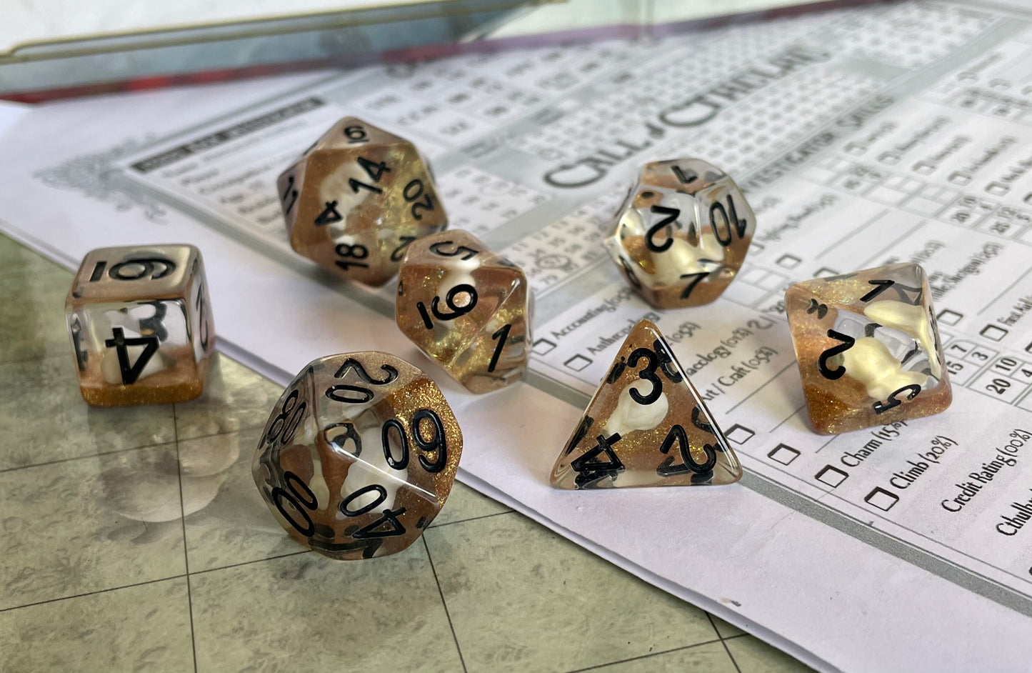 Entombed Poly Dice Set- Bird skull White in Gold